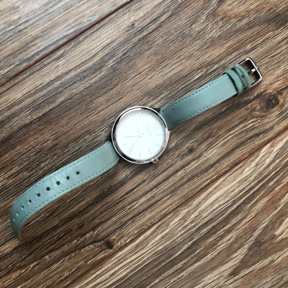 Teal fossil watch